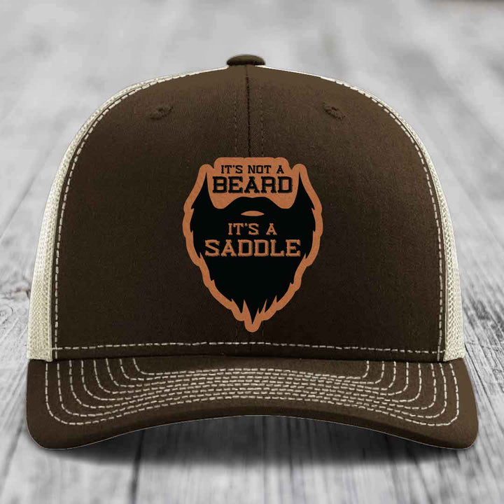 Its Not A Beard, Its A Saddle - Leather Patch Hat - Rawhide to Black Patch - Richardson 112 Snapback Trucker Hat