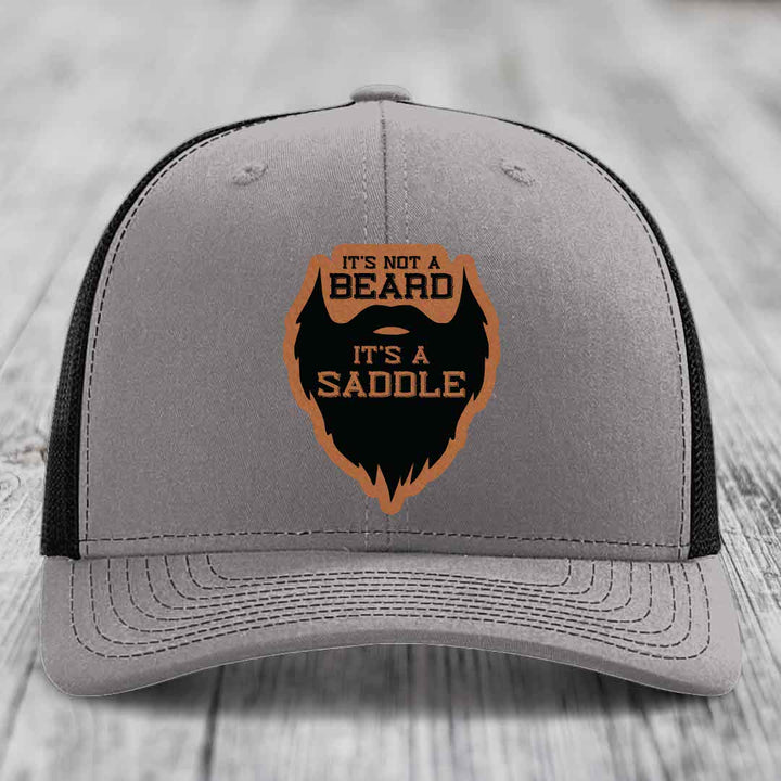 Its Not A Beard, Its A Saddle - Leather Patch Hat - Rawhide to Black Patch - Richardson 112 Snapback Trucker Hat
