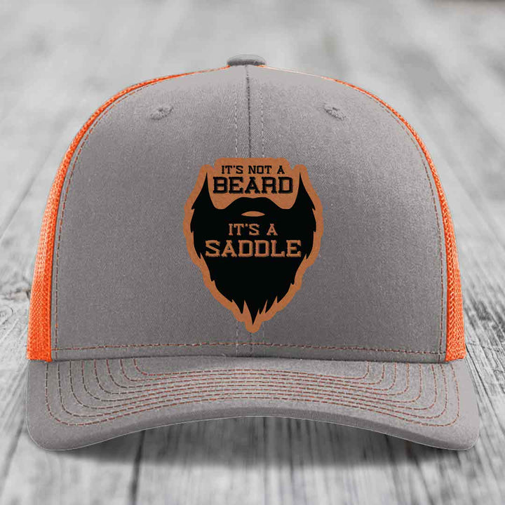 Its Not A Beard, Its A Saddle - Leather Patch Hat - Rawhide to Black Patch - Richardson 112 Snapback Trucker Hat