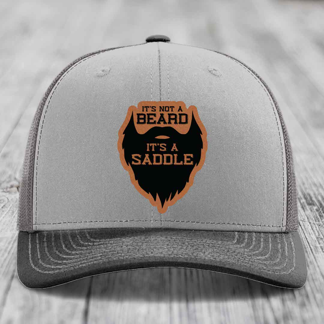 Its Not A Beard, Its A Saddle - Leather Patch Hat - Rawhide to Black Patch - Richardson 112 Snapback Trucker Hat