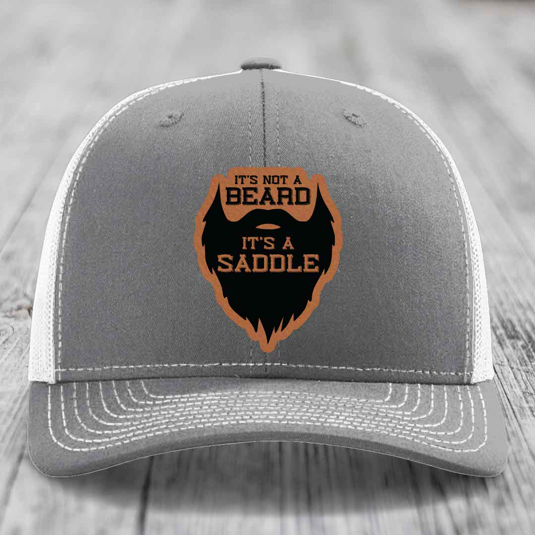 Its Not A Beard, Its A Saddle - Leather Patch Hat - Rawhide to Black Patch - Richardson 112 Snapback Trucker Hat