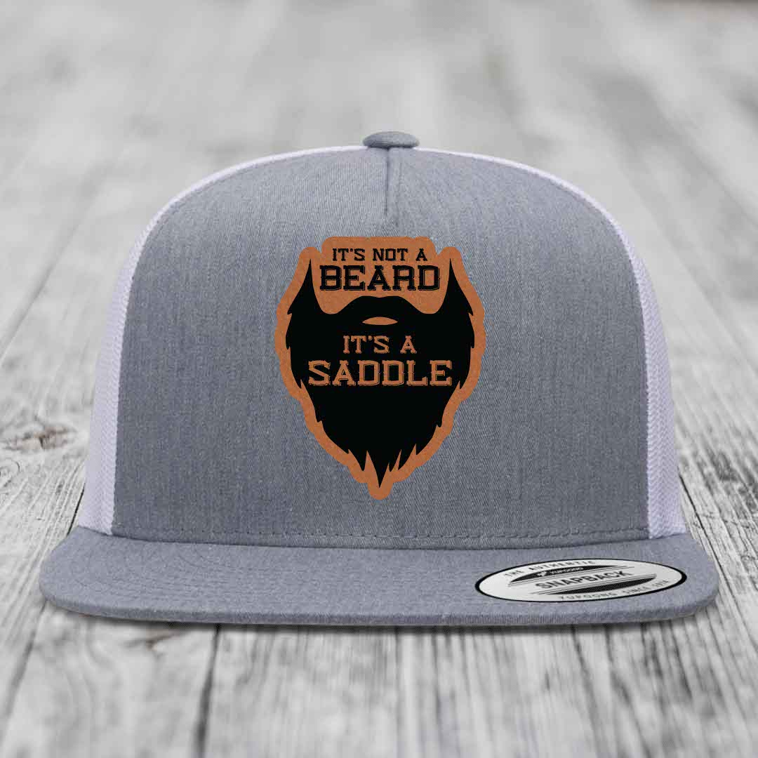 Its Not A Beard, Its A Saddle - Leather Patch Hat - Rawhide to Black Patch - Yupoong 6006 Snapback Flatbill Hat