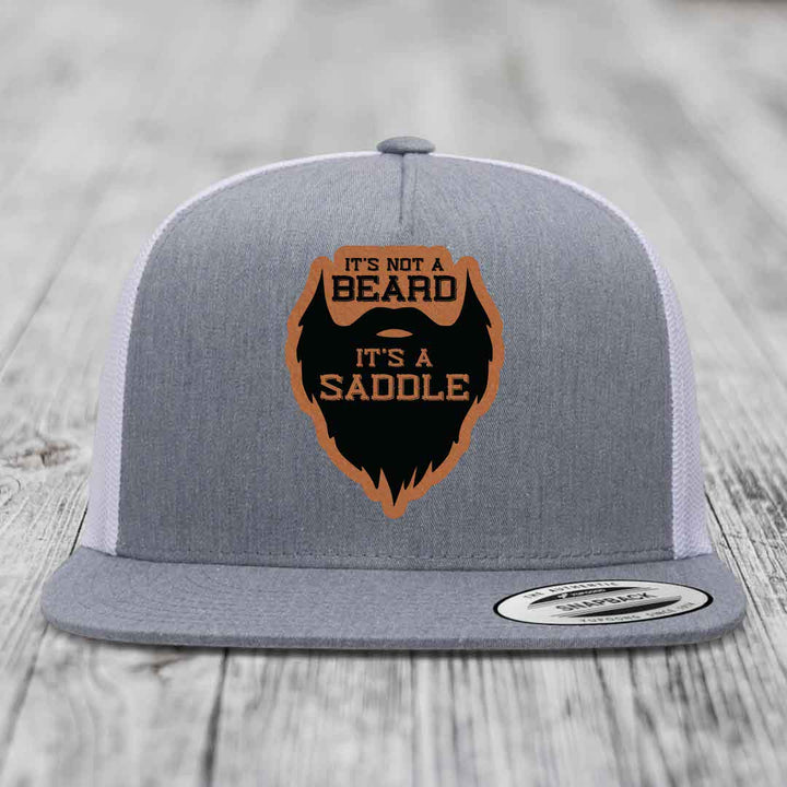 Its Not A Beard, Its A Saddle - Leather Patch Hat - Rawhide to Black Patch - Yupoong 6006 Snapback Flatbill Hat