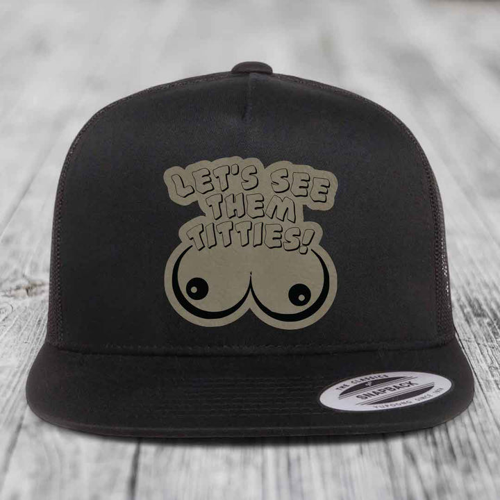 Lets See Them Titties - Leather Patch Hat - Light Brown to Black Patch - Yupoong 6006 Snapback Flatbill Hat