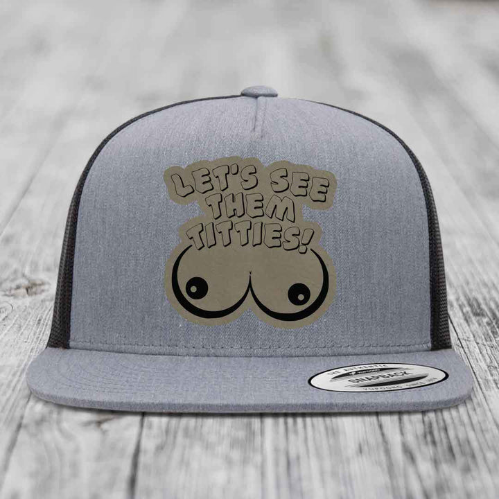 Lets See Them Titties - Leather Patch Hat - Light Brown to Black Patch - Yupoong 6006 Snapback Flatbill Hat
