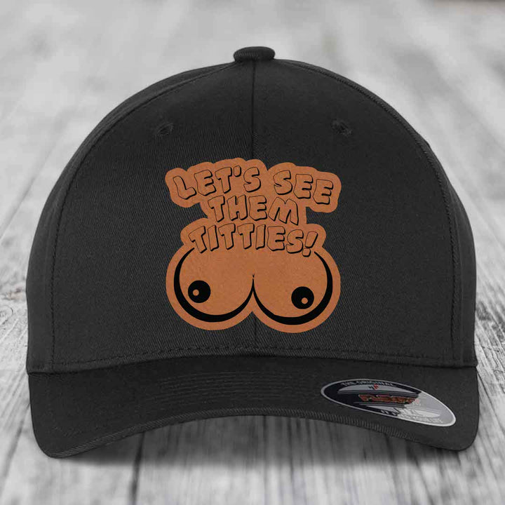Lets See Them Titties - Leather Patch Hat - Rawhide to Black Patch - Flexfit 6277 Fitted Hat