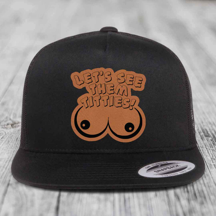 Lets See Them Titties - Leather Patch Hat - Rawhide to Black Patch - Yupoong 6006 Snapback Flatbill Hat