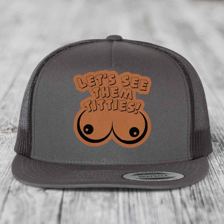 Lets See Them Titties - Leather Patch Hat - Rawhide to Black Patch - Yupoong 6006 Snapback Flatbill Hat