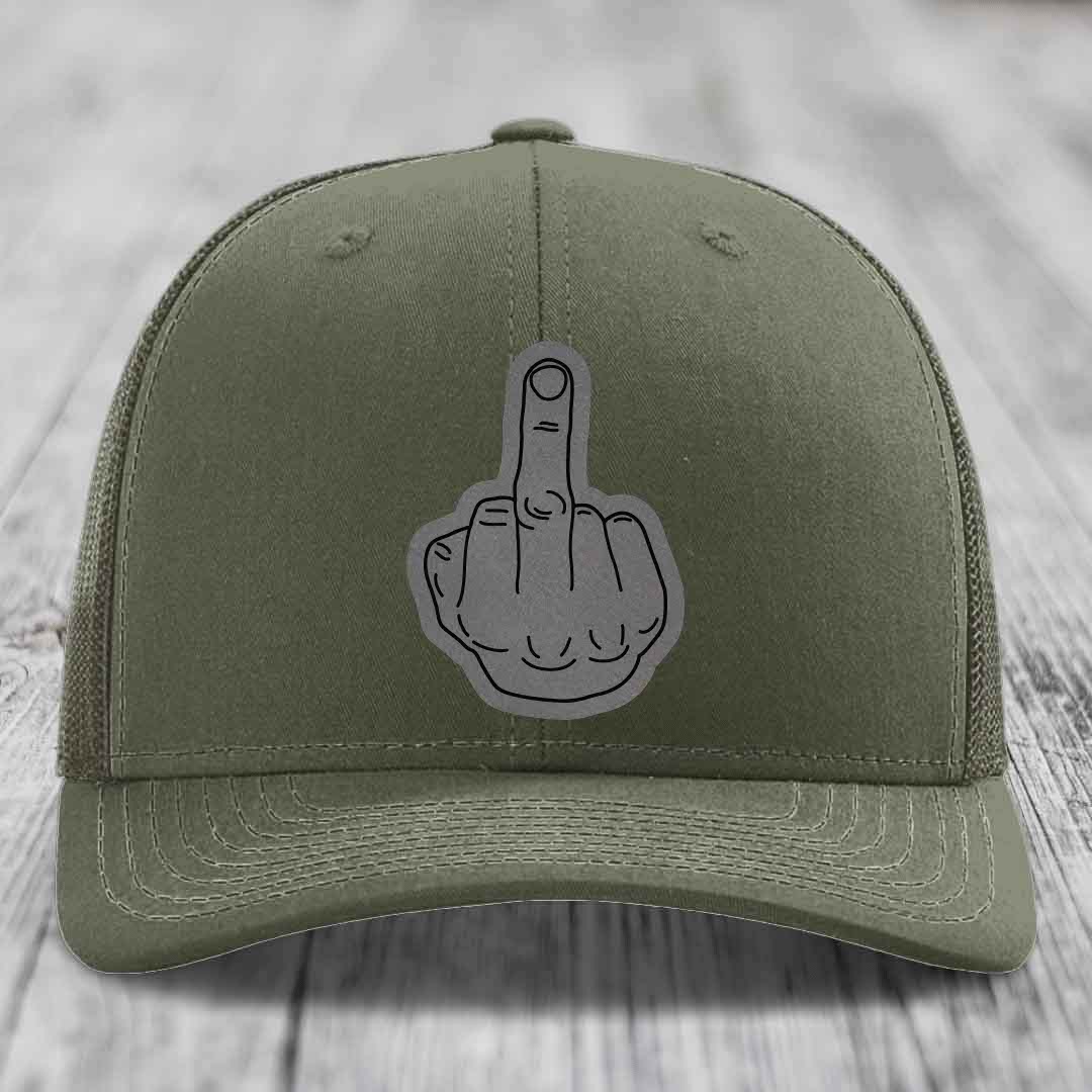 Olive green trucker hat with a grey middle finger patch on front.
