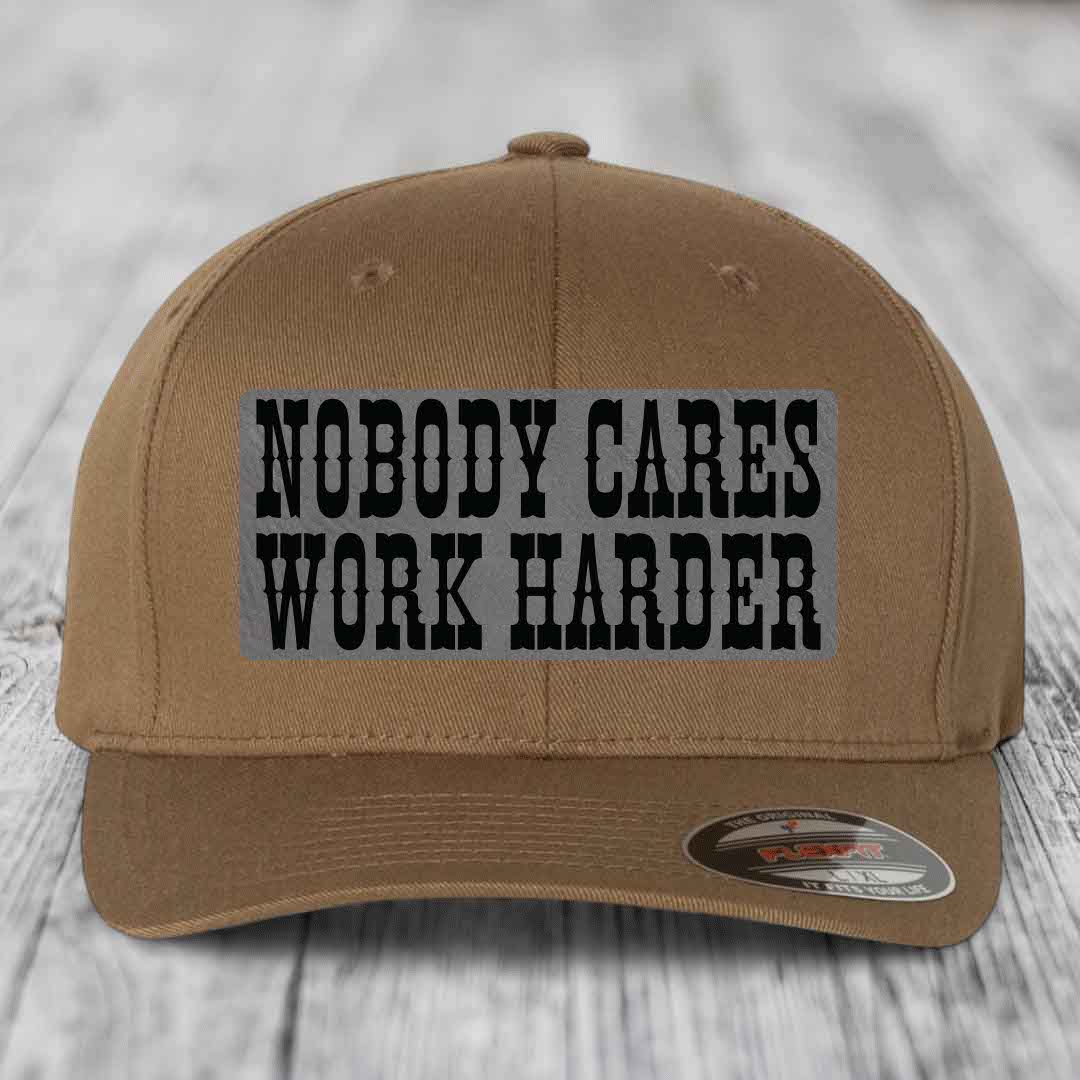 Nobody Cares, Work Harder - Leather Patch Hat - Grey to Black Patch - Flexfit 6277 Fitted Hat