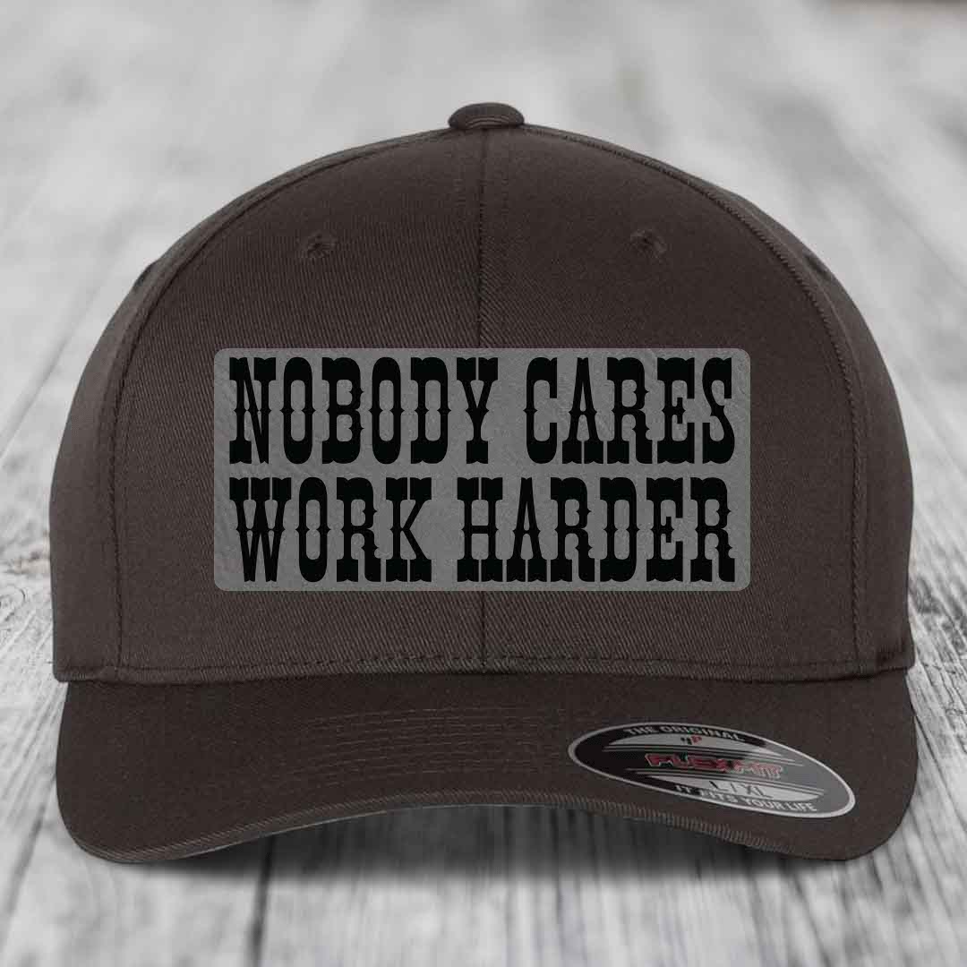 Nobody Cares, Work Harder - Leather Patch Hat - Grey to Black Patch - Flexfit 6277 Fitted Hat