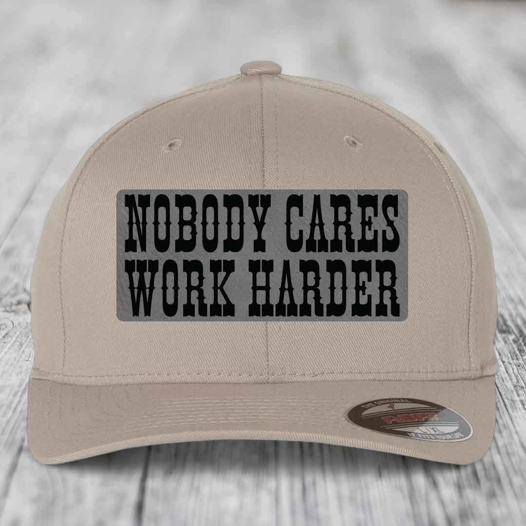 Nobody Cares, Work Harder - Leather Patch Hat - Grey to Black Patch - Flexfit 6277 Fitted Hat