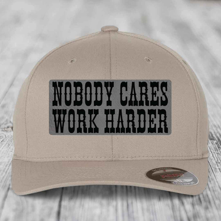 Nobody Cares, Work Harder - Leather Patch Hat - Grey to Black Patch - Flexfit 6277 Fitted Hat