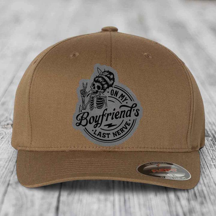 Tan baseball cap with &