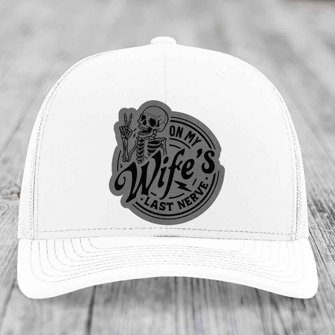 White trucker hat with black and grey &