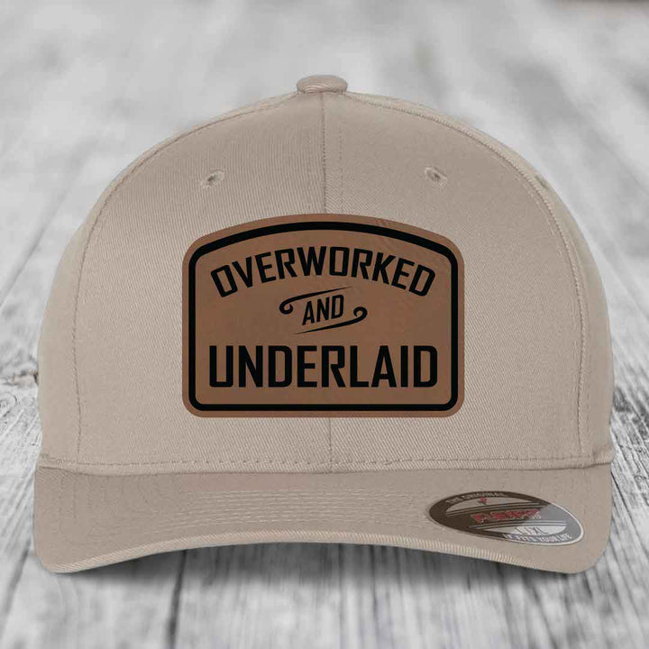 Overworked and Underlaid - Leather Patch Hat - Dark Brown to Black Patch - Flexfit 6277 Fitted Hat