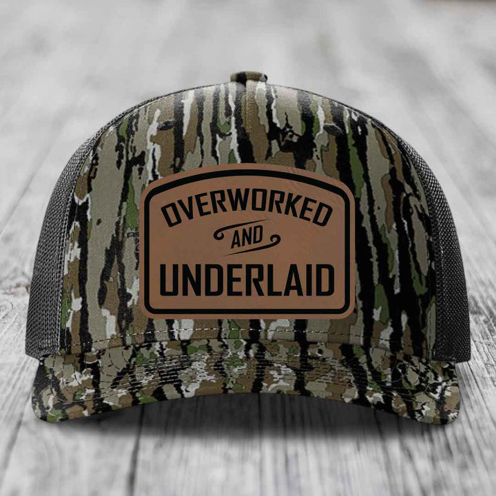 Overworked and Underlaid - Leather Patch Hat - Dark Brown to Black Patch - Richardson 112PFP Snapback Trucker Hat