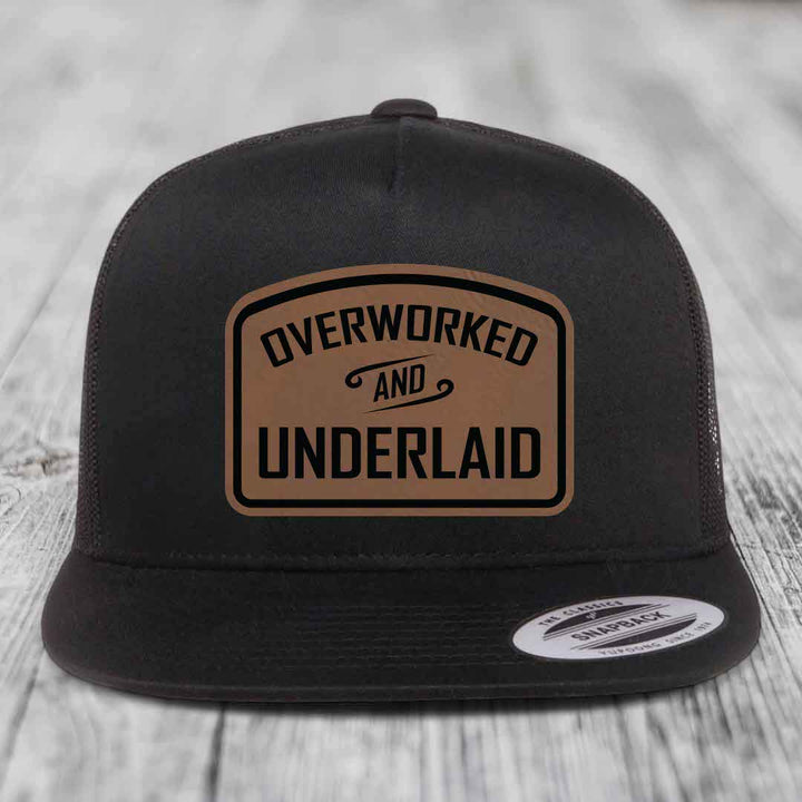 Overworked and Underlaid - Leather Patch Hat - Dark Brown to Black Patch - Yupoong 6006 Snapback Flatbill Hat