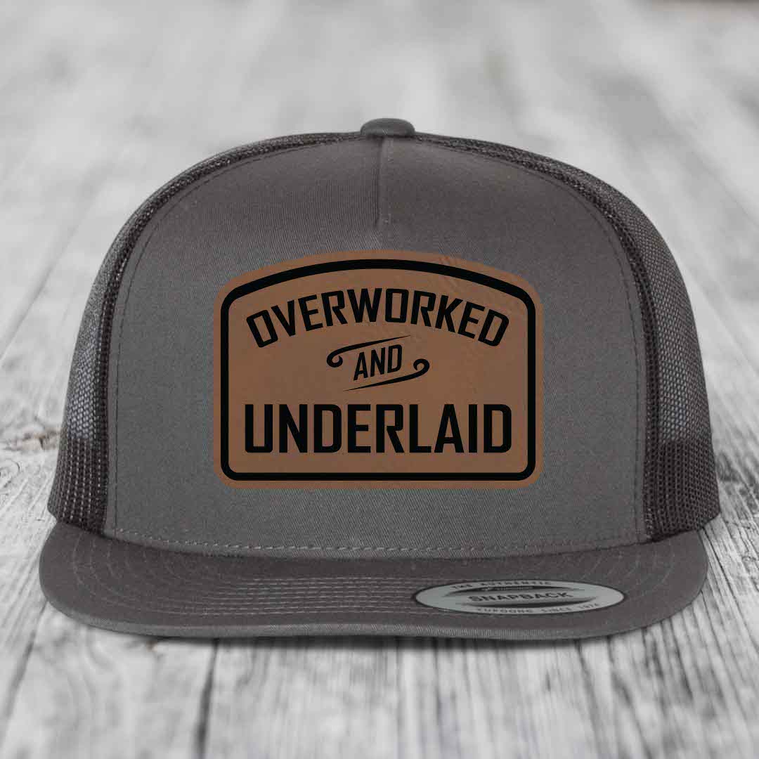 Overworked and Underlaid - Leather Patch Hat - Dark Brown to Black Patch - Yupoong 6006 Snapback Flatbill Hat