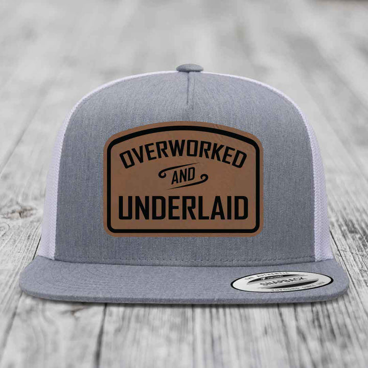 Overworked and Underlaid - Leather Patch Hat - Dark Brown to Black Patch - Yupoong 6006 Snapback Flatbill Hat