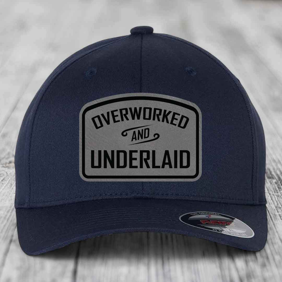 Overworked and Underlaid - Leather Patch Hat - Grey to Black Patch - Flexfit 6277 Fitted Hat