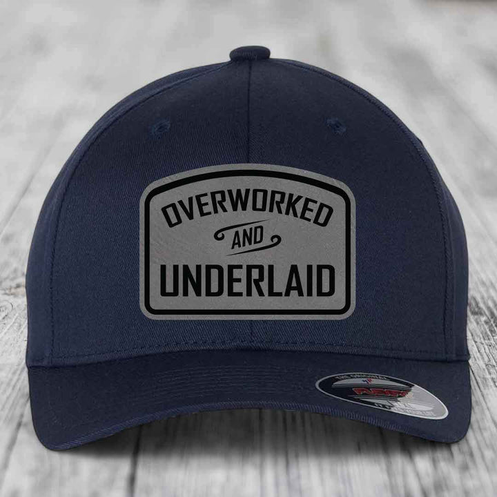 Overworked and Underlaid - Leather Patch Hat - Grey to Black Patch - Flexfit 6277 Fitted Hat