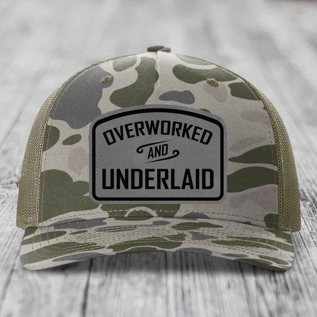 Overworked and Underlaid - Leather Patch Hat - Grey to Black Patch - Richardson 112PFP Snapback Trucker Hat