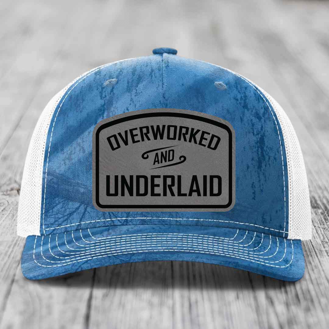 Overworked and Underlaid - Leather Patch Hat - Grey to Black Patch - Richardson 112PFP Snapback Trucker Hat