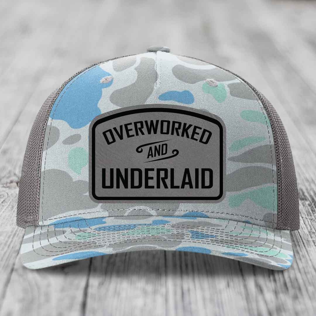 Overworked and Underlaid - Leather Patch Hat - Grey to Black Patch - Richardson 112PFP Snapback Trucker Hat
