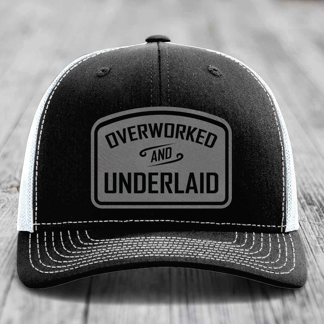 Overworked and Underlaid - Leather Patch Hat - Grey to Black Patch - Richardson 112 Snapback Trucker Hat