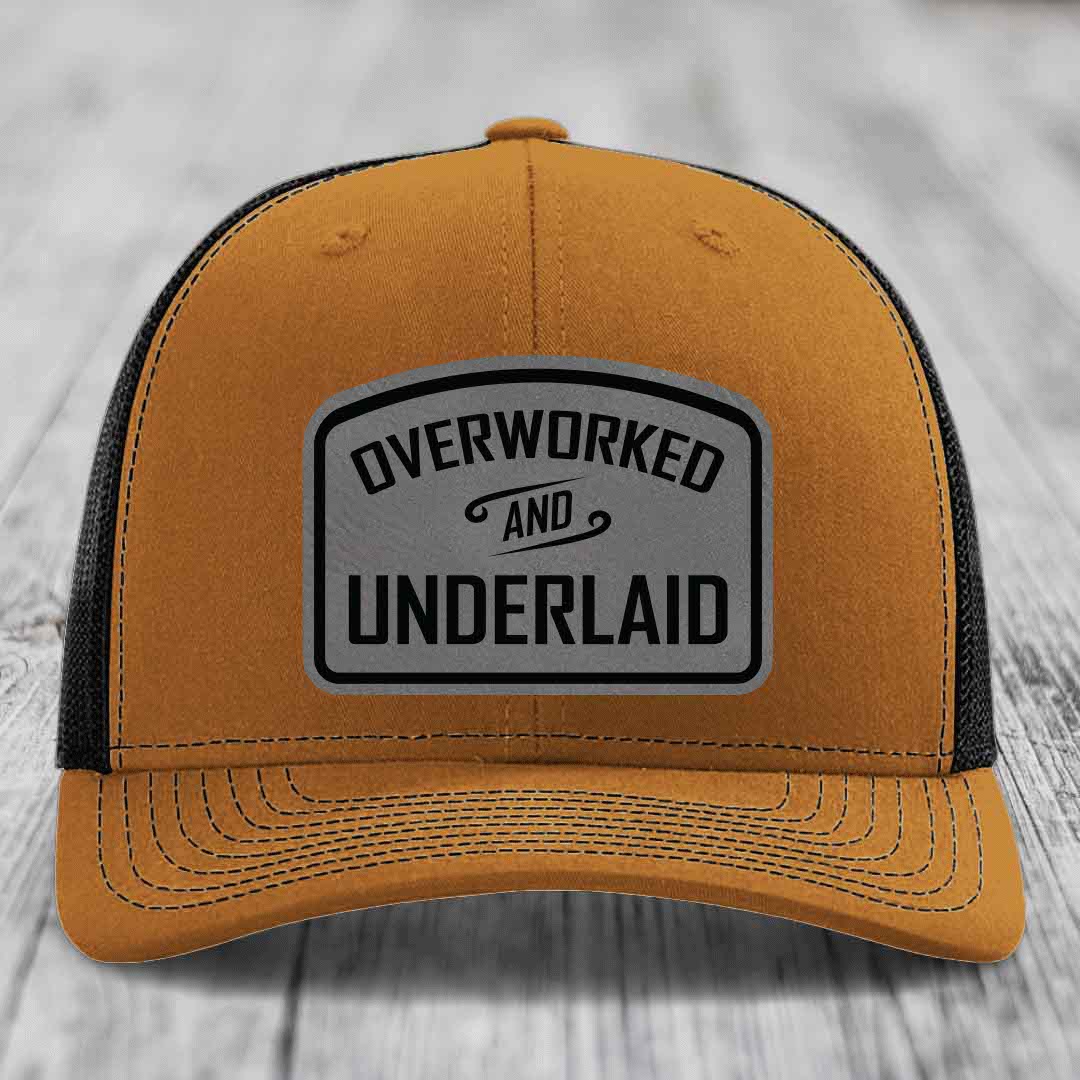 Overworked and Underlaid - Leather Patch Hat - Grey to Black Patch - Richardson 112 Snapback Trucker Hat