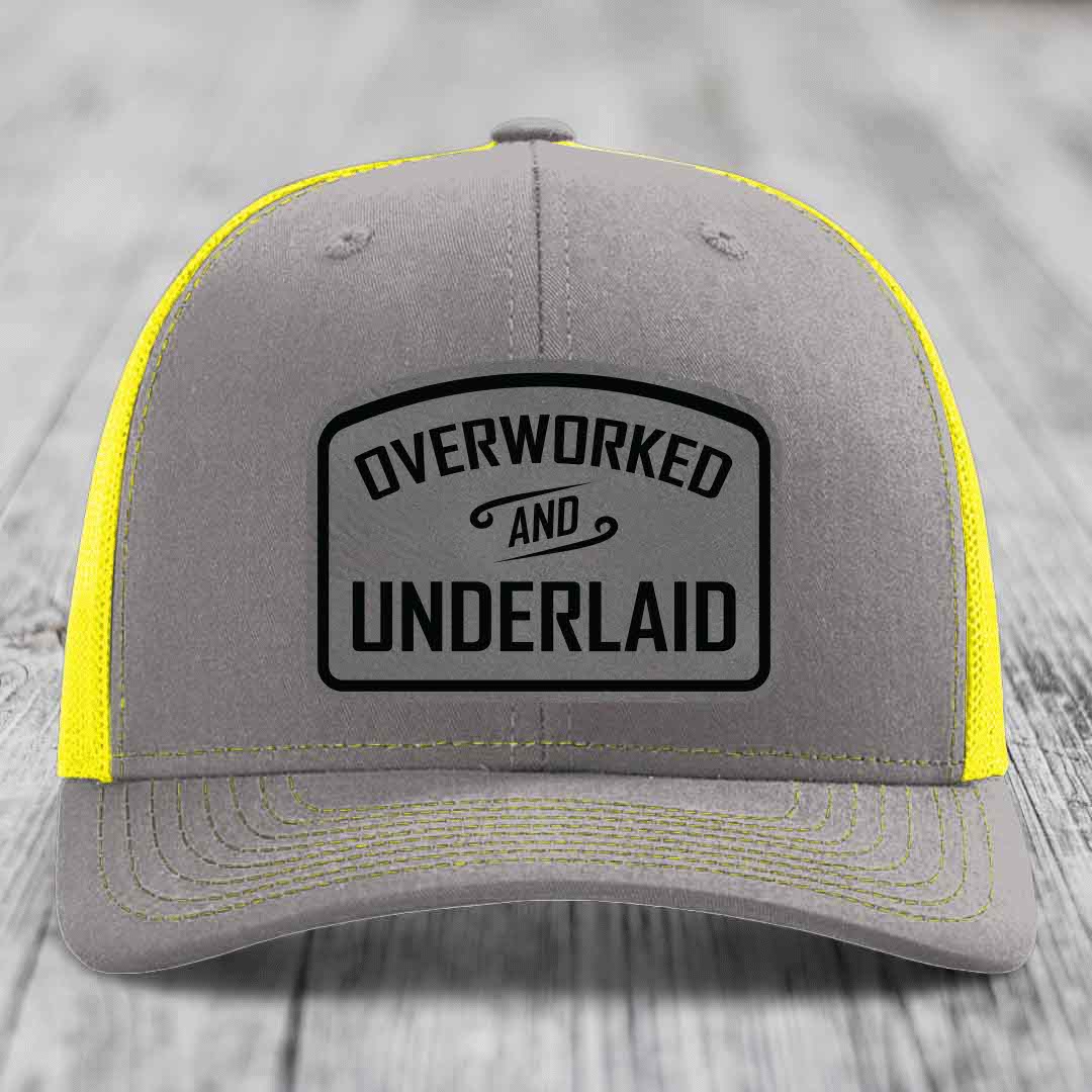 Overworked and Underlaid - Leather Patch Hat - Grey to Black Patch - Richardson 112 Snapback Trucker Hat