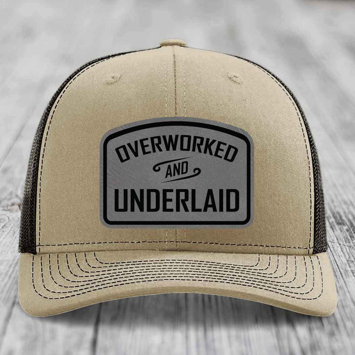 Overworked and Underlaid - Leather Patch Hat - Grey to Black Patch - Richardson 112 Snapback Trucker Hat
