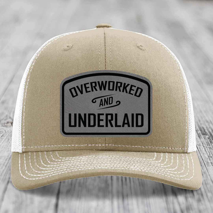 Overworked and Underlaid - Leather Patch Hat - Grey to Black Patch - Richardson 112 Snapback Trucker Hat