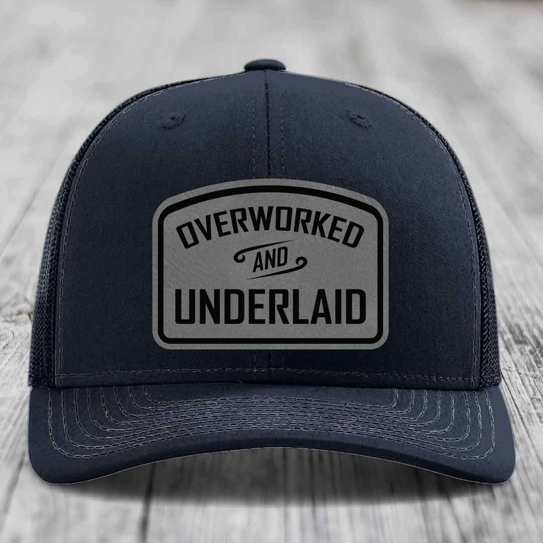 Overworked and Underlaid - Leather Patch Hat - Grey to Black Patch - Richardson 112 Snapback Trucker Hat