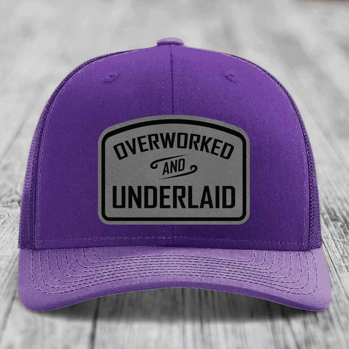 Overworked and Underlaid - Leather Patch Hat - Grey to Black Patch - Richardson 112 Snapback Trucker Hat