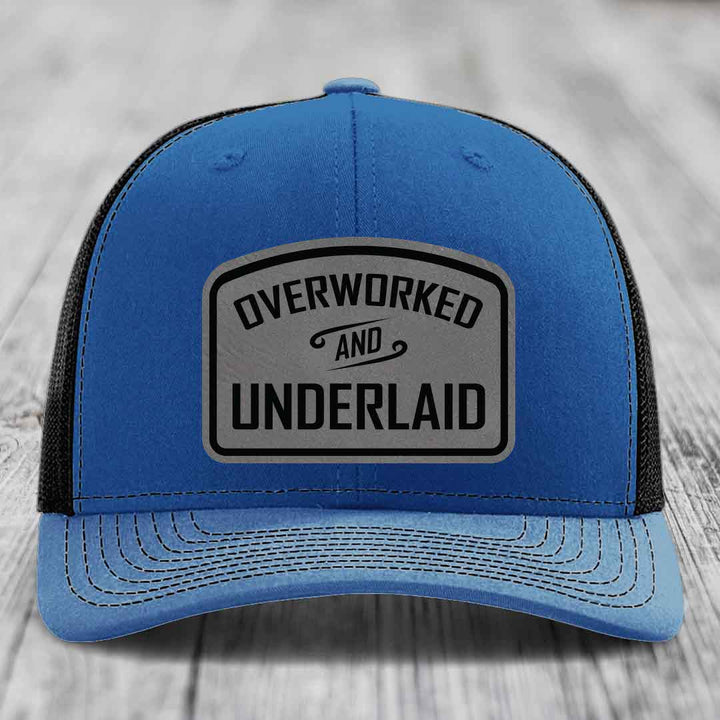 Overworked and Underlaid - Leather Patch Hat - Grey to Black Patch - Richardson 112 Snapback Trucker Hat