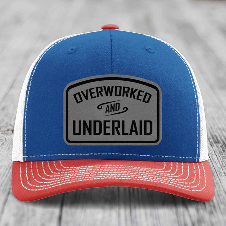 Overworked and Underlaid - Leather Patch Hat - Grey to Black Patch - Richardson 112 Snapback Trucker Hat