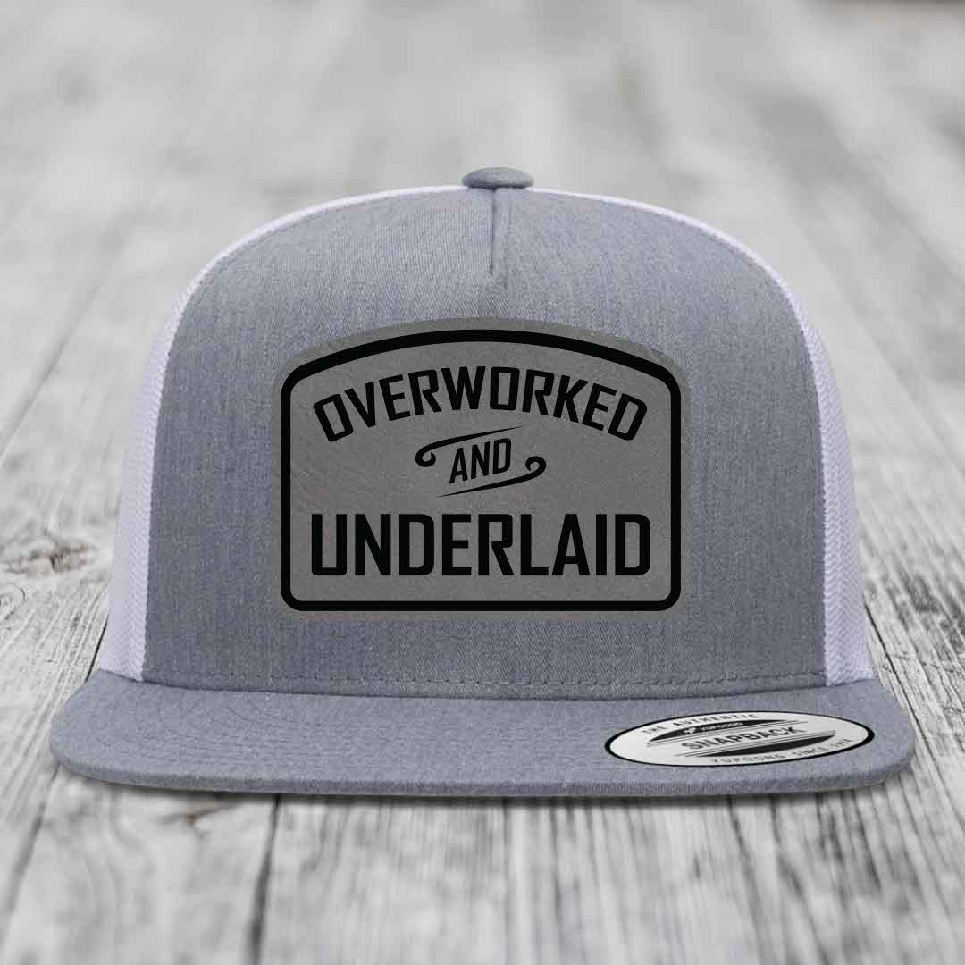 Overworked and Underlaid - Leather Patch Hat - Grey to Black Patch - Yupoong 6006 Snapback Flatbill Hat
