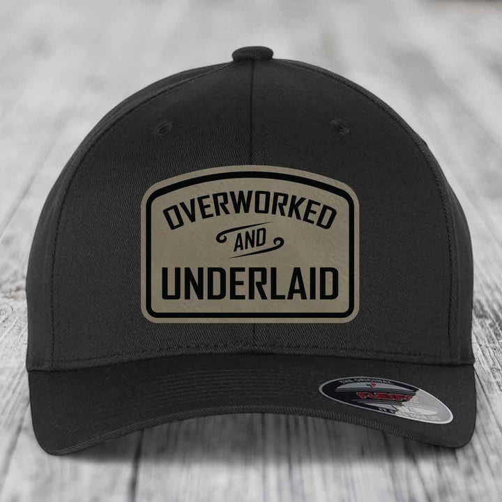 Overworked and Underlaid - Leather Patch Hat - Light Brown to Black Patch - Flexfit 6277 Fitted Hat