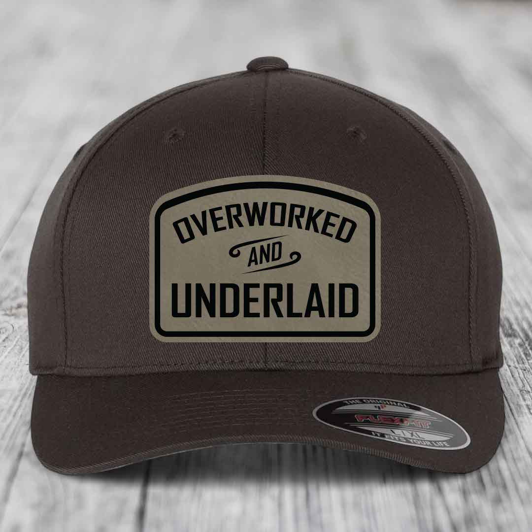 Overworked and Underlaid - Leather Patch Hat - Light Brown to Black Patch - Flexfit 6277 Fitted Hat