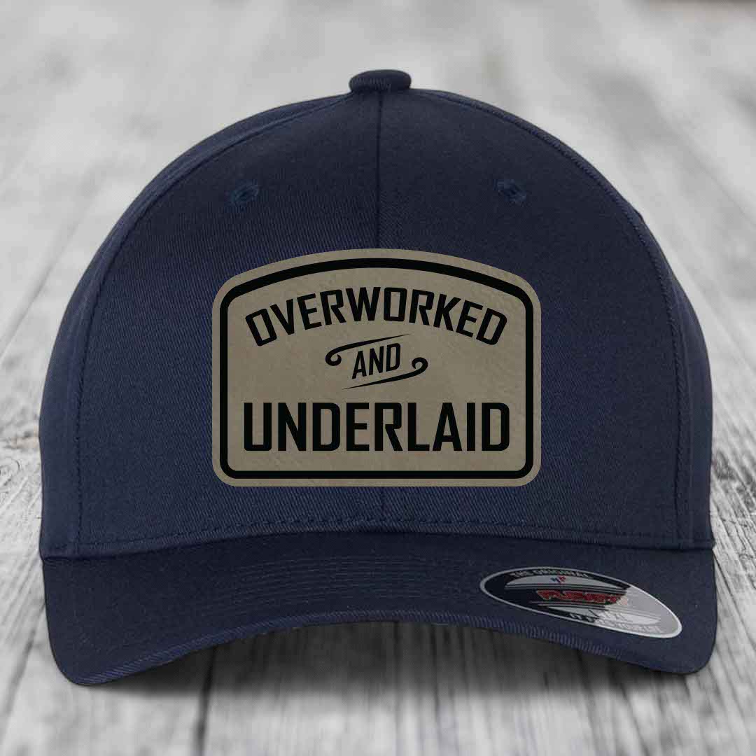 Overworked and Underlaid - Leather Patch Hat - Light Brown to Black Patch - Flexfit 6277 Fitted Hat