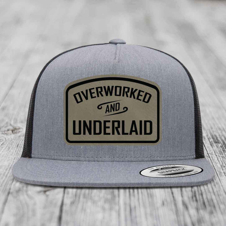 Overworked and Underlaid - Leather Patch Hat - Light Brown to Black Patch - Yupoong 6006 Snapback Flatbill Hat