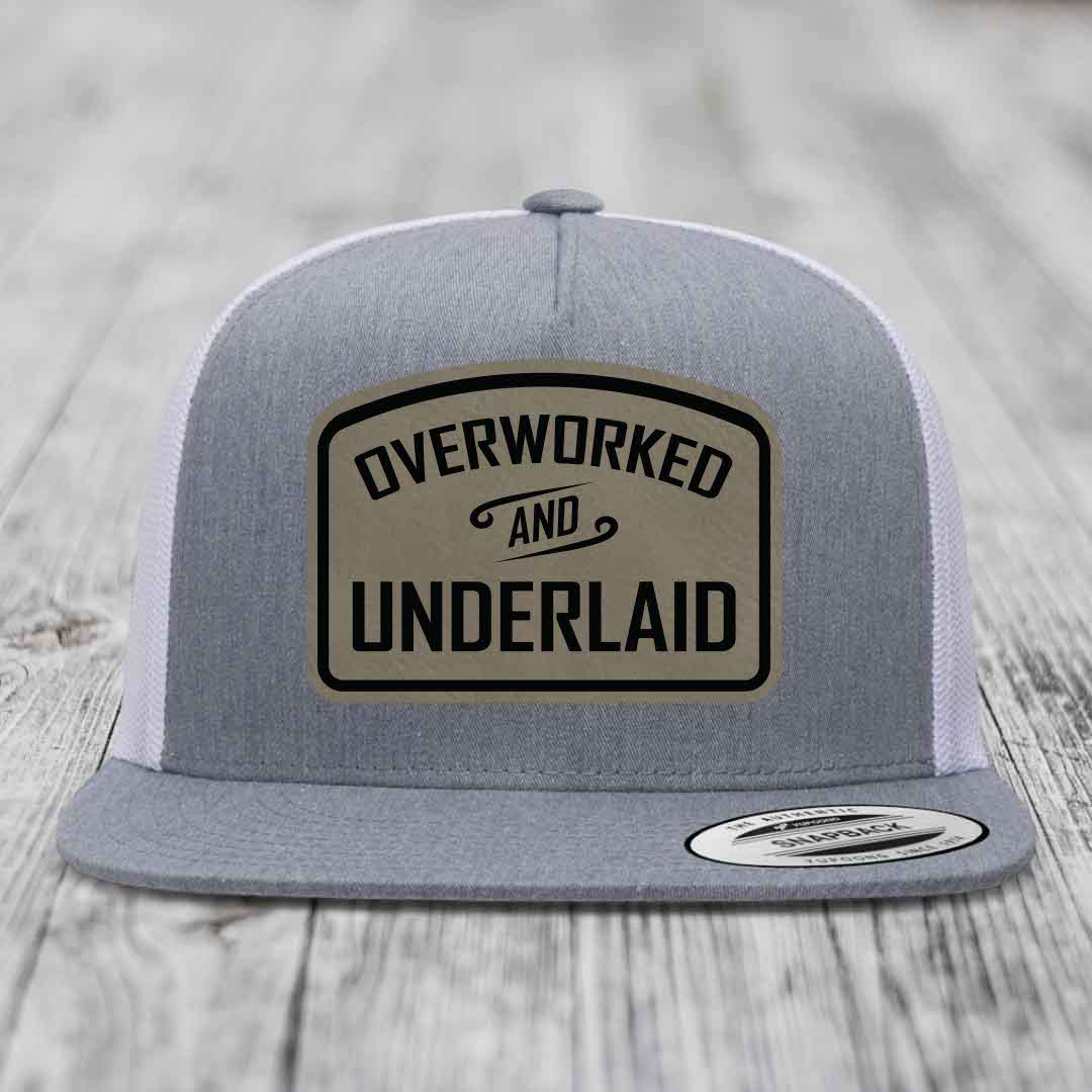 Overworked and Underlaid - Leather Patch Hat - Light Brown to Black Patch - Yupoong 6006 Snapback Flatbill Hat