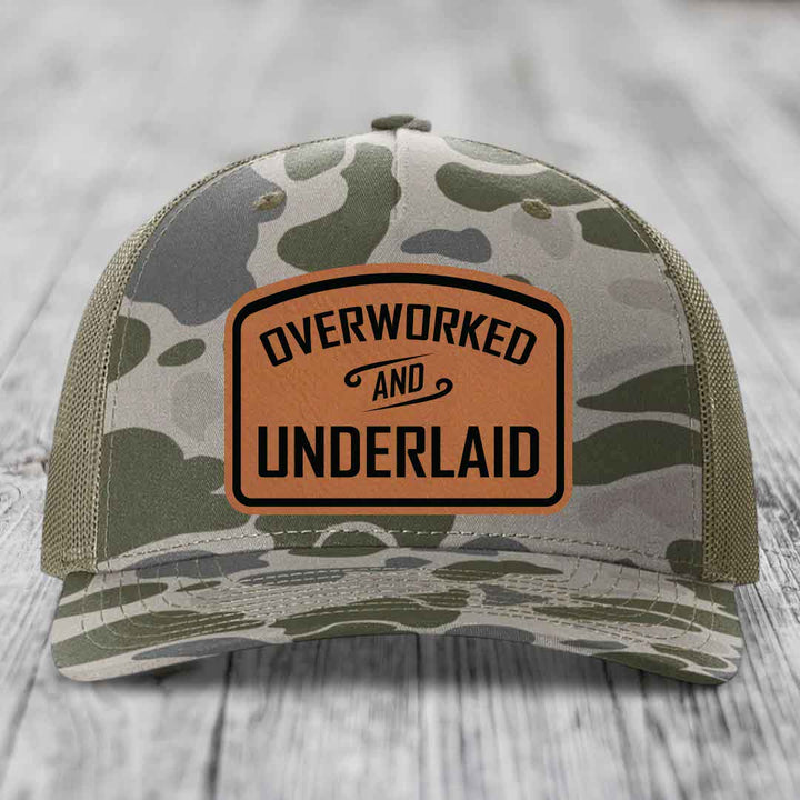 Overworked and Underlaid - Leather Patch Hat - Rawhide to Black Patch - Richardson 112PFP Snapback Trucker Hat
