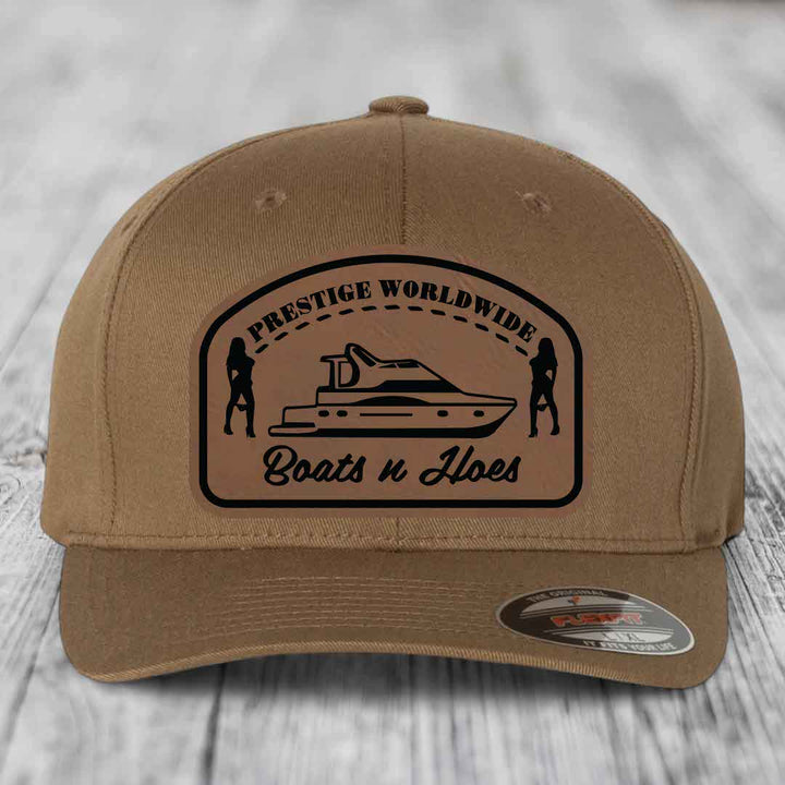 Prestige Worldwide, Boats and Hoes - Leather Patch Hat - Dark Brown to Black Patch - Flexfit 6277 Fitted Hat