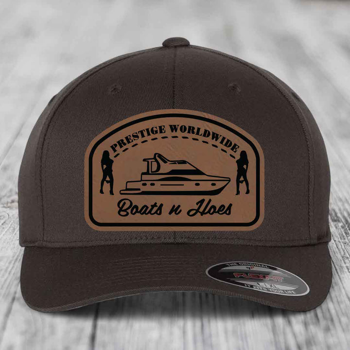 Prestige Worldwide, Boats and Hoes - Leather Patch Hat - Dark Brown to Black Patch - Flexfit 6277 Fitted Hat
