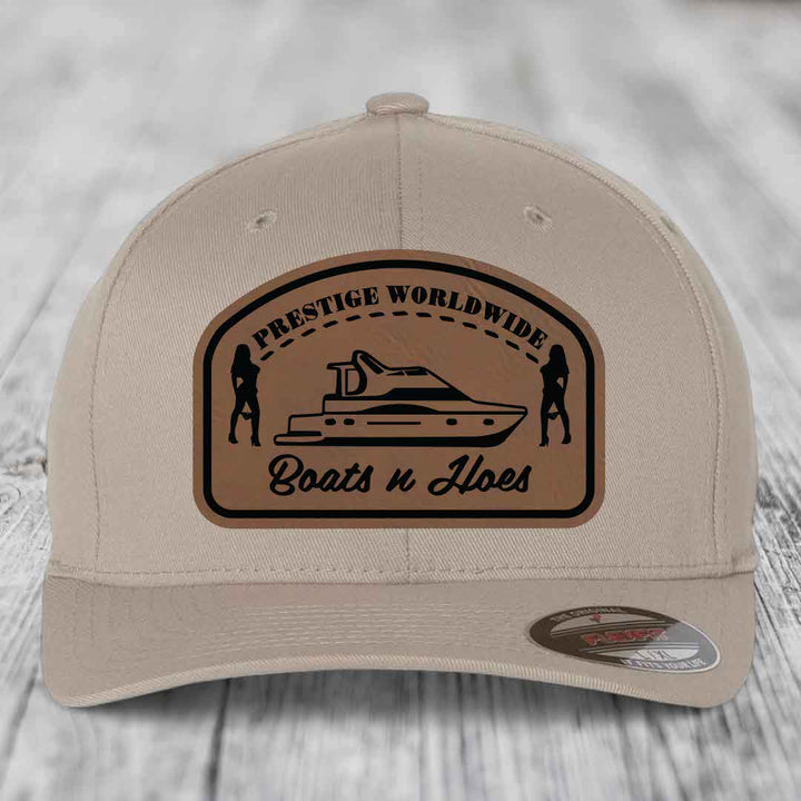 Prestige Worldwide, Boats and Hoes - Leather Patch Hat - Dark Brown to Black Patch - Flexfit 6277 Fitted Hat