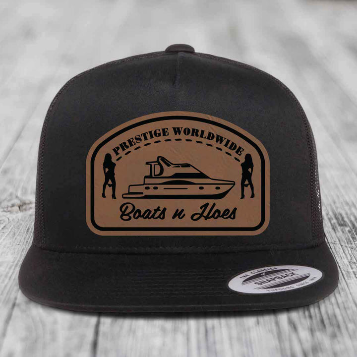 Prestige Worldwide, Boats and Hoes - Leather Patch Hat - Dark Brown to Black Patch - Yupoong 6006 Snapback Flatbill Hat
