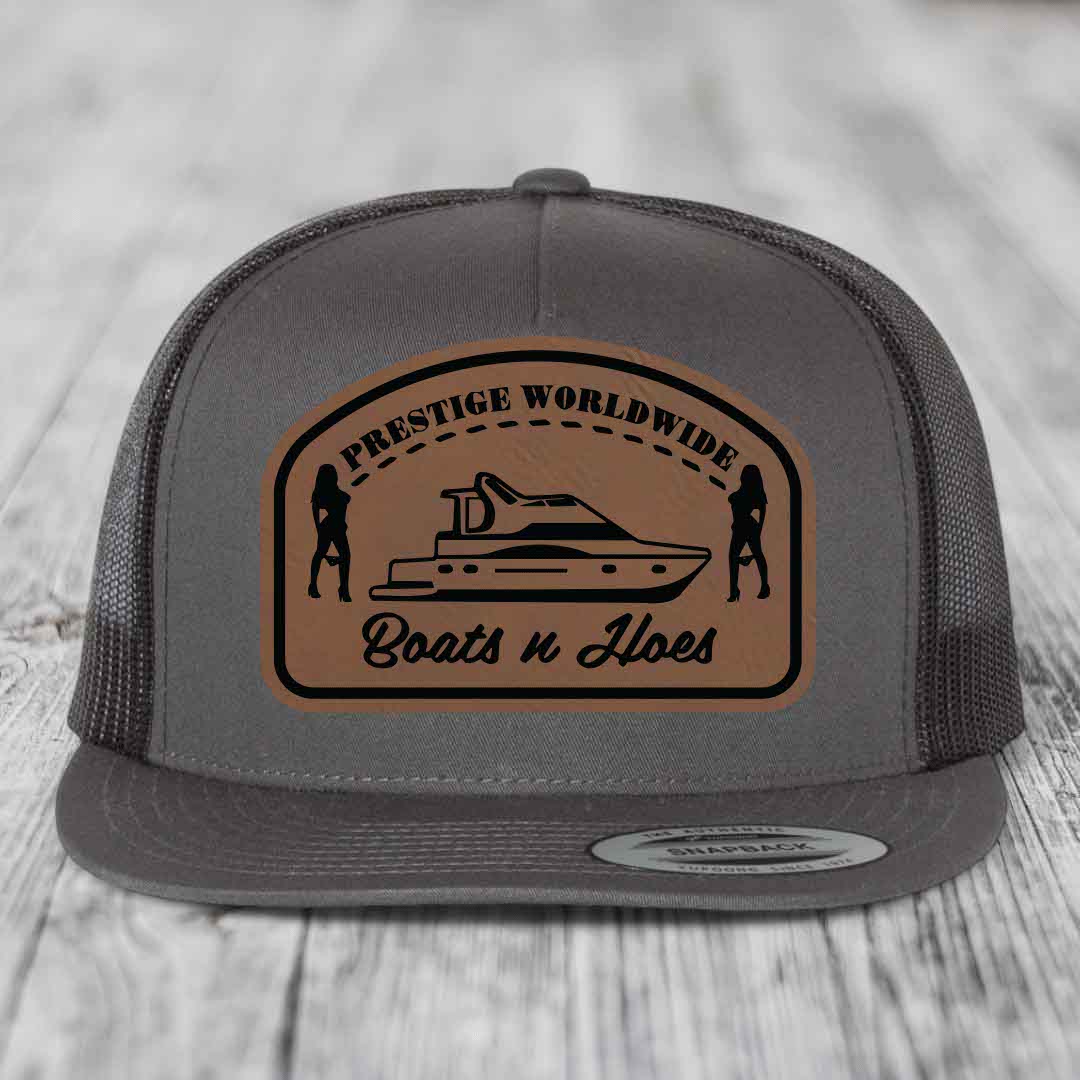 Prestige Worldwide, Boats and Hoes - Leather Patch Hat - Dark Brown to Black Patch - Yupoong 6006 Snapback Flatbill Hat